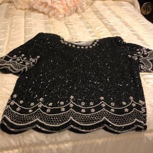 Woman’s elegant black evening blouse